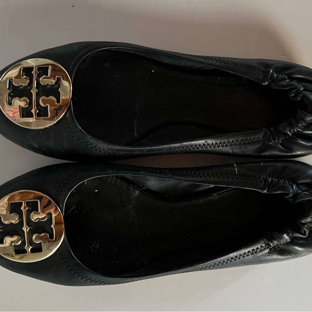 Tory Burch Black Flats with Gold Emblem